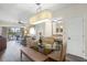 Dining area with glass table and bench seating at 12538 Floridays Resort Dr # 411, Orlando, FL 32821