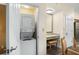 Stackable washer and dryer in a small closet at 12538 Floridays Resort Dr # 411, Orlando, FL 32821
