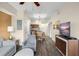 Open concept living area showcasing a kitchen and dining area at 12538 Floridays Resort Dr # 411, Orlando, FL 32821