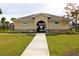 Community pool house with gated entry at 1280 Tupelo Trl, Haines City, FL 33844