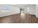Bright and airy bedroom with wood-look flooring and sliding glass doors at 13380 Sw 60Th Court Rd, Ocala, FL 34473
