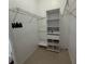 Walk-in closet with shelving at 143 Glasgow Ct, Davenport, FL 33897