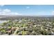 Aerial view showing a large residential area near a body of water at 1534 Gants Cir, Kissimmee, FL 34744