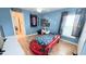 Bright bedroom featuring a car shaped bed, light blue walls, and a ceiling fan at 1534 Gants Cir, Kissimmee, FL 34744