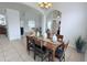 Open dining area featuring stylish furniture and decor, seamlessly flowing into other living spaces at 1534 Gants Cir, Kissimmee, FL 34744