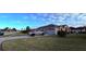 Gray truck parked in driveway of tan house at 1534 Gants Cir, Kissimmee, FL 34744