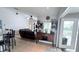 View of the living room featuring a built-in entertainment center and a charming bar cabinet at 1534 Gants Cir, Kissimmee, FL 34744