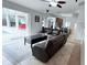 The living room flows seamlessly to the lanai and features tile flooring at 1534 Gants Cir, Kissimmee, FL 34744