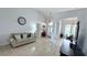 Bright living room featuring large windows, neutral colors, and open layout enhancing the living experience at 1534 Gants Cir, Kissimmee, FL 34744