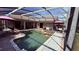 Beautiful screened-in pool and spa with patio area, perfect for outdoor gatherings and enjoying the sun at 1534 Gants Cir, Kissimmee, FL 34744