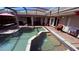 Beautiful screened-in pool and spa with patio area, perfect for outdoor gatherings and enjoying the sun at 1534 Gants Cir, Kissimmee, FL 34744