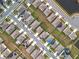 Aerial view of neighborhood with houses and solar panels at 1634 Reddish Egret Ct, Davenport, FL 33897