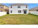 Large backyard with fenced perimeter at 1634 Reddish Egret Ct, Davenport, FL 33897