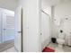 Clean bathroom with toilet, tub, and shower at 1634 Reddish Egret Ct, Davenport, FL 33897
