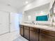 Clean bathroom, double vanity, and spacious layout at 1634 Reddish Egret Ct, Davenport, FL 33897
