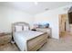 Bedroom with a double bed and dresser at 1634 Reddish Egret Ct, Davenport, FL 33897