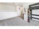 Spacious bedroom with a built-in loft bed and desk at 1634 Reddish Egret Ct, Davenport, FL 33897