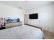 Bedroom with a double bed and TV at 1634 Reddish Egret Ct, Davenport, FL 33897