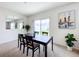 Cozy dining area with sliding door access to backyard at 1634 Reddish Egret Ct, Davenport, FL 33897