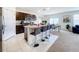 Modern kitchen with granite countertops, stainless steel appliances, and an island at 1634 Reddish Egret Ct, Davenport, FL 33897