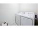 Convenient laundry room with washer and dryer at 1634 Reddish Egret Ct, Davenport, FL 33897