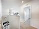 Upstairs hallway with access to bedrooms and closets at 1634 Reddish Egret Ct, Davenport, FL 33897