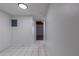 Clean and bright hallway with tiled flooring leading to other rooms at 200 Maitland Ave # 86, Altamonte Springs, FL 32701