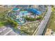 Aerial view of community pool, water park, and mini golf at 2190 Lelani Cir, Davenport, FL 33897