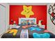 Super Mario themed bedroom with a full-size bed and fun decor at 2190 Lelani Cir, Davenport, FL 33897
