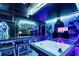 Star Wars themed game room with air hockey, arcade games, and neon lighting at 2190 Lelani Cir, Davenport, FL 33897
