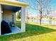 Covered patio overlooks a serene lake view at 2304 Cedar Garden Dr, Orlando, FL 32824