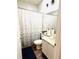 Clean bathroom with shower/tub combo and updated vanity at 2304 Cedar Garden Dr, Orlando, FL 32824