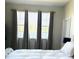 Main bedroom with lake view and neutral color palette at 2304 Cedar Garden Dr, Orlando, FL 32824