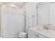 Well-maintained bathroom with a shower, toilet, sink and neutral color palette at 2929 Caribbean Soul Dr, Kissimmee, FL 34747