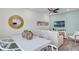 Bright living room with a white table, a comfortable couch, and a flat-screen TV at 2929 Caribbean Soul Dr, Kissimmee, FL 34747