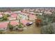 Community overview, showcasing homes with red tile roofs at 3033 Sangria St, Kissimmee, FL 34744