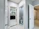 Bathroom with toilet, sink and mirrored closet at 3033 Sangria St, Kissimmee, FL 34744