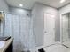 Bathroom with shower/tub combo and patterned shower curtain at 3033 Sangria St, Kissimmee, FL 34744
