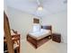 Bedroom with double bed, dresser, and ceiling fan at 3033 Sangria St, Kissimmee, FL 34744