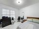 Bright bedroom with a bed, dresser, and window coverings at 3033 Sangria St, Kissimmee, FL 34744