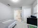 Bedroom with double bed, french doors and closet at 3033 Sangria St, Kissimmee, FL 34744