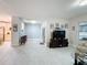 Bright living room features tile floors, and an open concept floorplan at 3033 Sangria St, Kissimmee, FL 34744