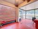 Relaxing screened porch with brick flooring and view of trees at 3033 Sangria St, Kissimmee, FL 34744