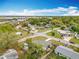 Aerial view of the neighborhood showcases the well-maintained homes and lush green landscaping at 420 Sunrise Dr, Orlando, FL 32803