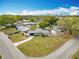 An aerial view of a well-maintained single-story house, showcasing its modern design and surrounding landscape at 420 Sunrise Dr, Orlando, FL 32803
