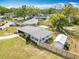 Aerial view of the backyard featuring a storage shed and a fenced-in yard for privacy and security at 420 Sunrise Dr, Orlando, FL 32803
