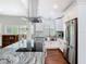Bright kitchen with stainless appliances, granite counters, and modern design at 420 Sunrise Dr, Orlando, FL 32803