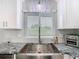 Kitchen sink features stainless steel appliances and a window view at 420 Sunrise Dr, Orlando, FL 32803