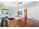 Open concept living area leads to a sunroom with a modern design at 420 Sunrise Dr, Orlando, FL 32803