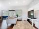Bright living room with large windows and sliding doors with hardwood floors at 420 Sunrise Dr, Orlando, FL 32803